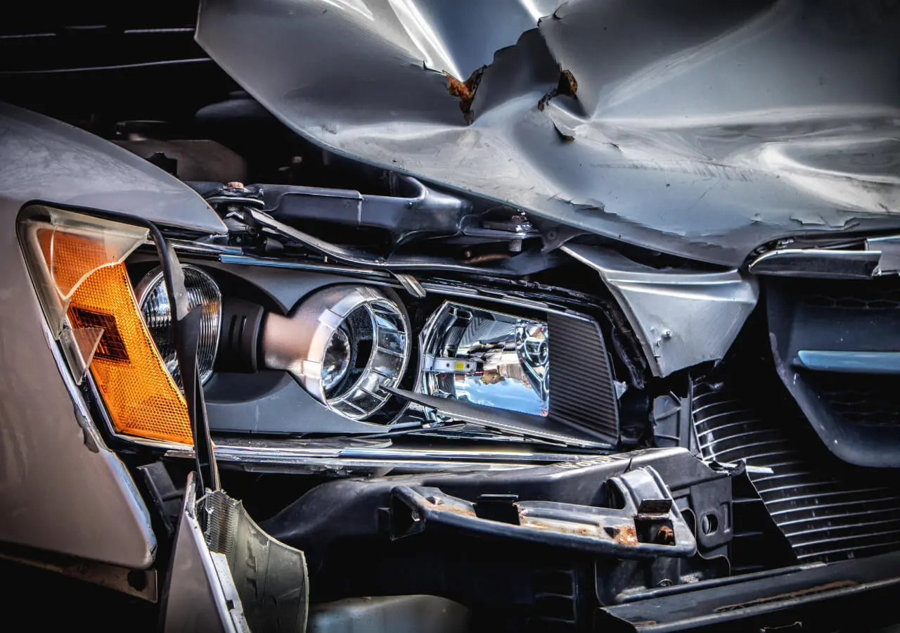 closeup shot of a damaged car in an accident