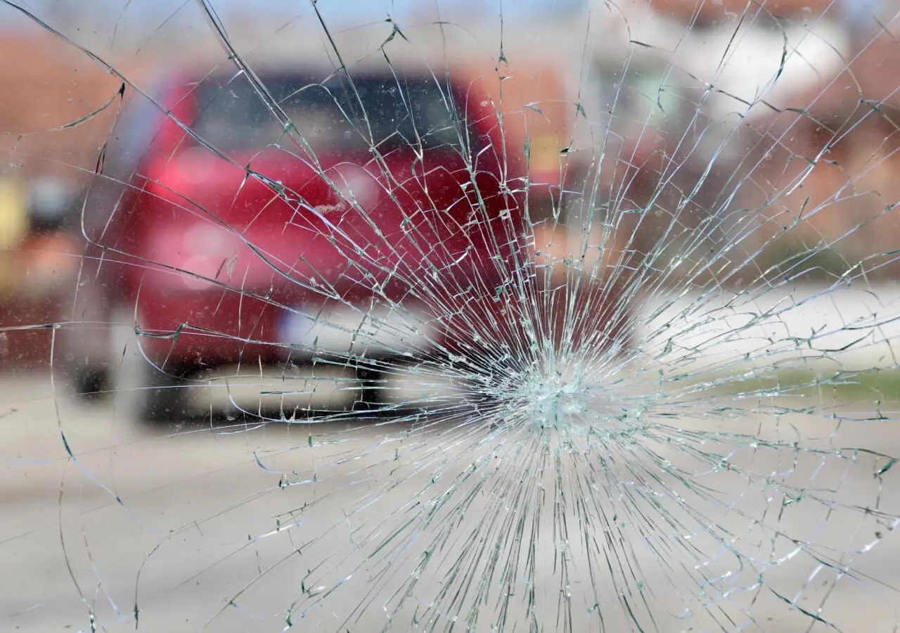 closeup shot of damaged glass of a car